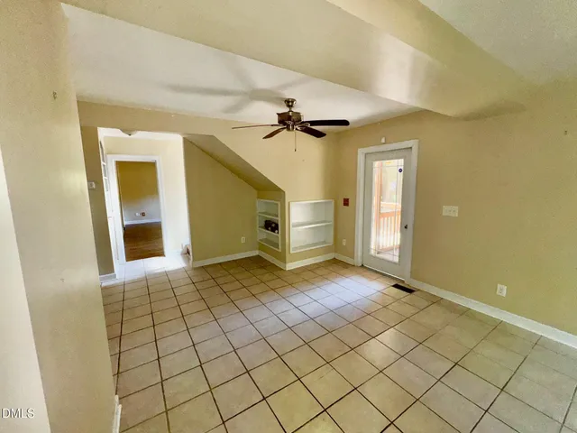 a view of an empty room and window