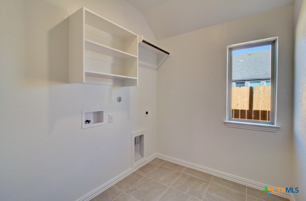 2118 Shepard Street Seguin, TX 78155 - Photo 14 of 24 a view of an empty room with a window