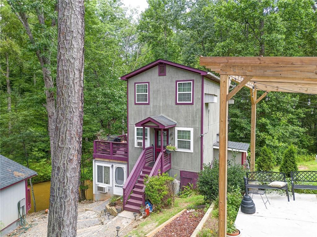 41 Summit Ridge Drive Southeast Cartersville, GA 30120 - Photo 27 of 43 a front view of a house with a yard