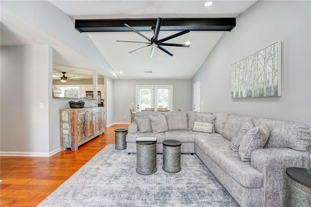 41 Summit Ridge Drive Southeast Cartersville, GA 30120 - Photo 3 of 43 a living room with furniture and a wooden floor