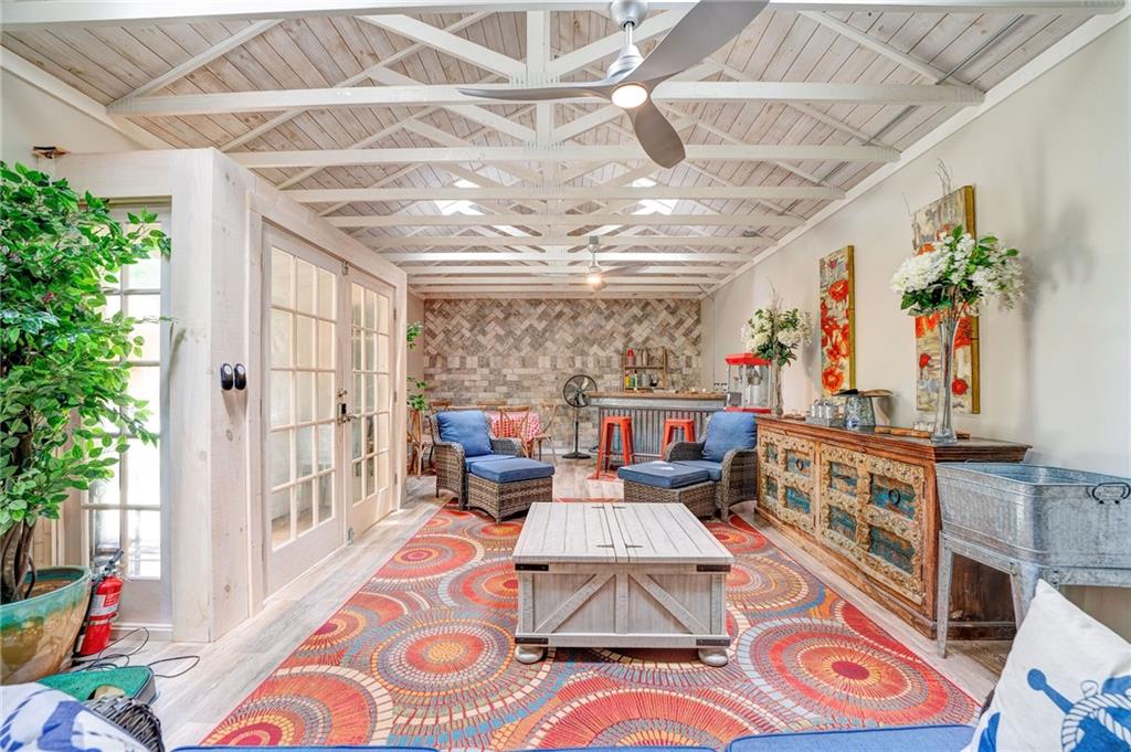 41 Summit Ridge Drive Southeast Cartersville, GA 30120 - Photo 39 of 43 a living room with furniture and a chandelier