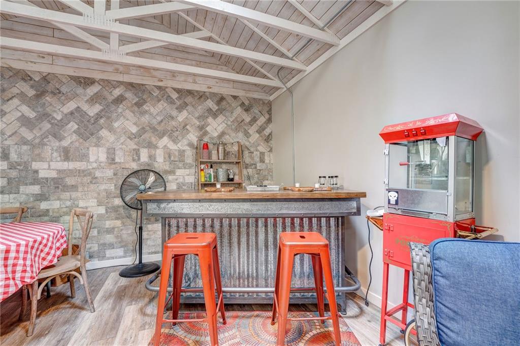 41 Summit Ridge Drive Southeast Cartersville, GA 30120 - Photo 40 of 43 a dining room with furniture and wooden floor