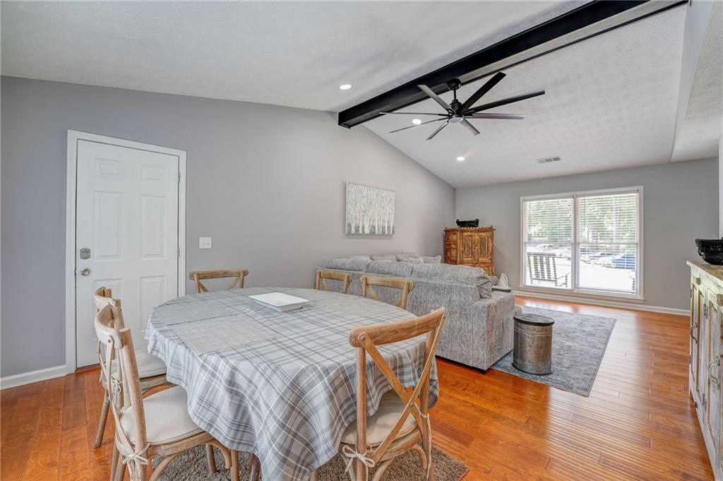 41 Summit Ridge Drive Southeast Cartersville, GA 30120 - Photo 6 of 43 a view of a dining room with furniture window and wooden floor
