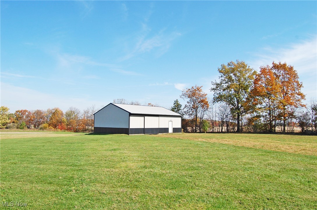 26875 W Road Wellington, OH 44090 - Photo 23 of 26 View of yard featuring an outbuilding