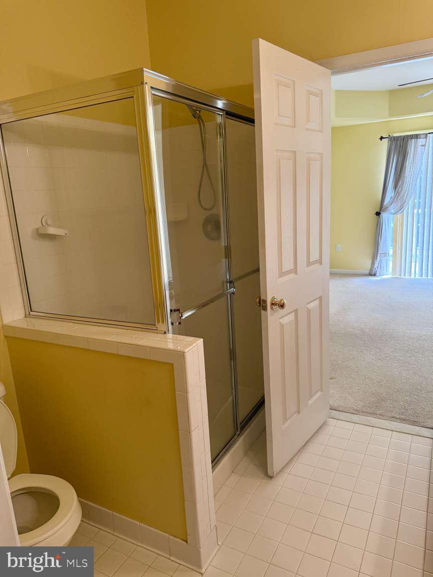 629 Ruxton Road, Unit 74 Solomons, MD 20629 - Photo 12 of 24 a bathroom with a sink and a shower
