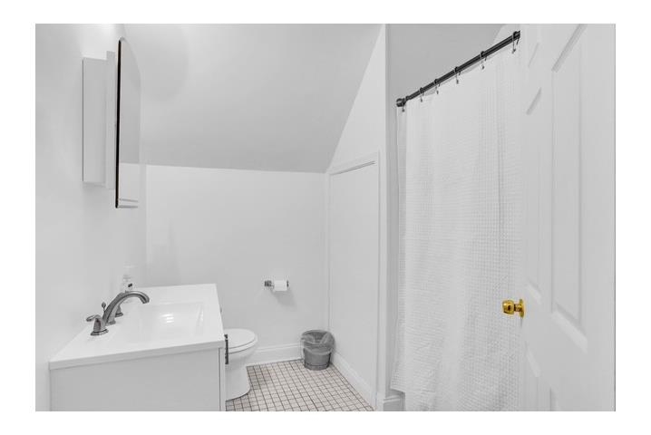 2181 Madison Avenue Memphis, TN 38104 - Photo 11 of 18 a bathroom with a sink and a mirror