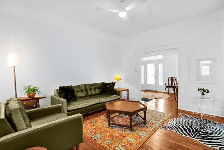 2181 Madison Avenue Memphis, TN 38104 - Photo 4 of 18 a living room with furniture a couch and wooden floor