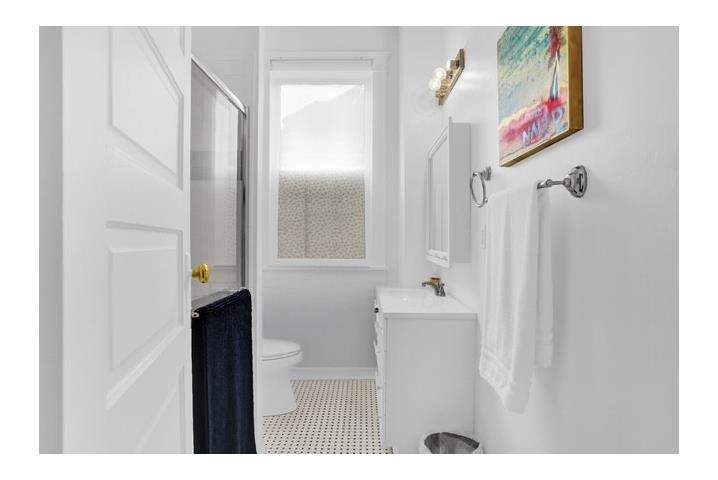 2181 Madison Avenue Memphis, TN 38104 - Photo 9 of 18 a bathroom with a bathtub and a shower