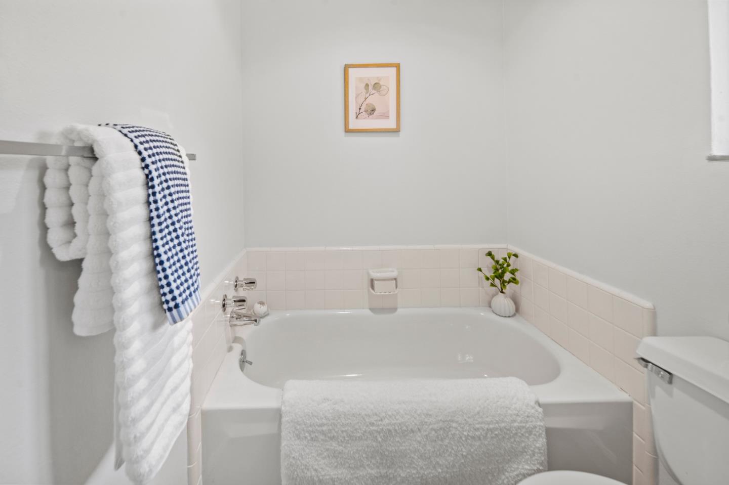70 Forest Ridge Road, Unit 22 Monterey, CA 93940 - Photo 12 of 17 a bathroom with a white tub