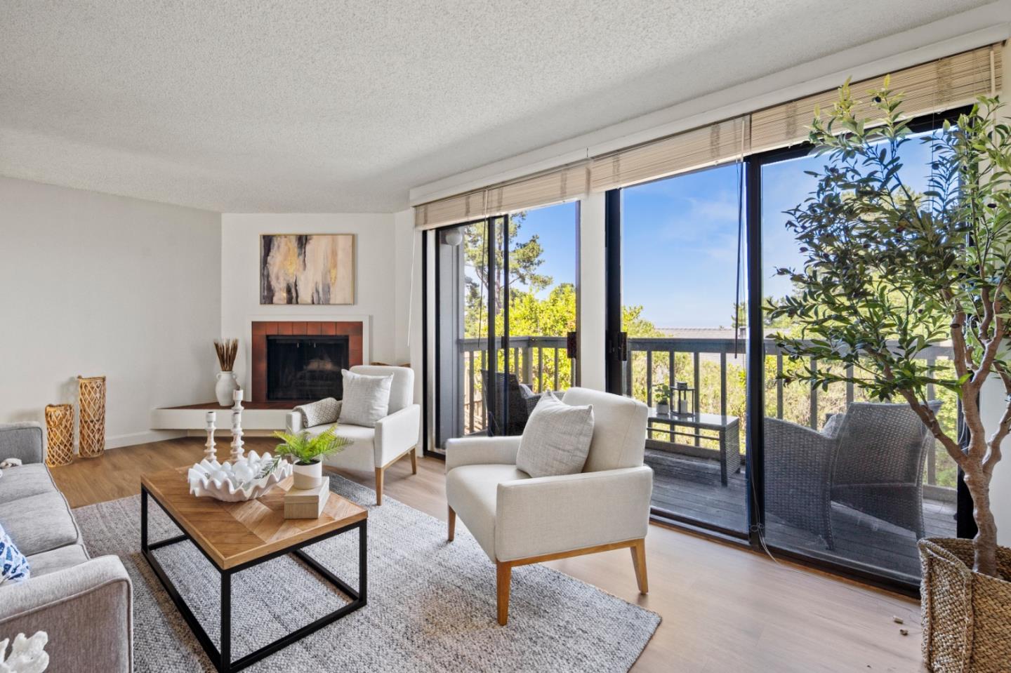 70 Forest Ridge Road, Unit 22 Monterey, CA 93940 - Photo 2 of 17 a living room with furniture and a large window