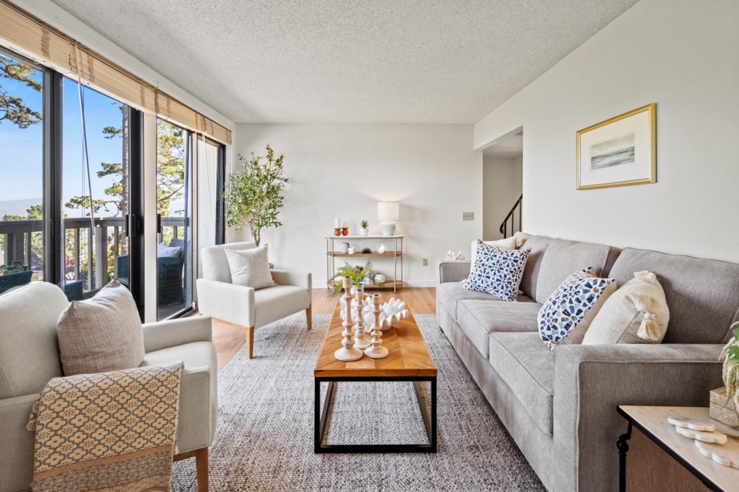 70 Forest Ridge Road, Unit 22 Monterey, CA 93940 - Photo 3 of 17 a living room with furniture and a large window