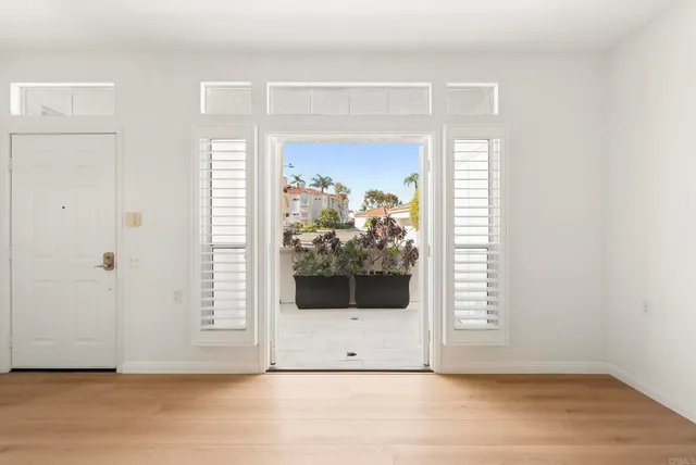 a view of a livingroom with wooden floor