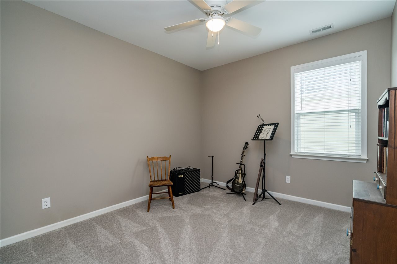 439 Plainview Avenue Raleigh, NC 27604 - Photo 24 of 29 This home has good separation between the master bedroom and the other second floor bedrooms. Fourth Bedroom
