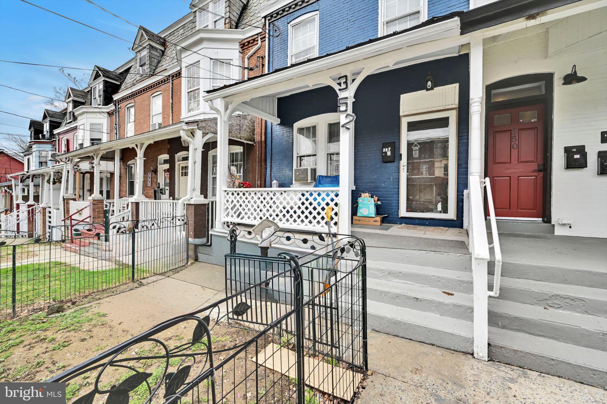352 South Ann Street Lancaster, PA 17602 - Photo 3 of 23 a view of a brick building with a bench in patio