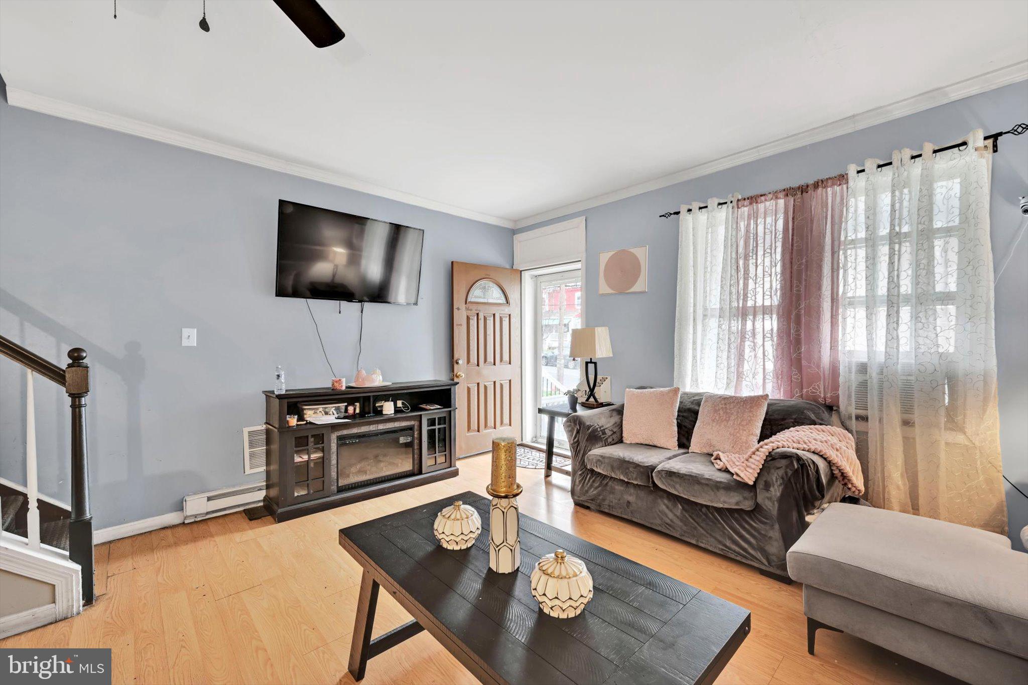 352 South Ann Street Lancaster, PA 17602 - Photo 5 of 23 a living room with furniture and a flat screen tv