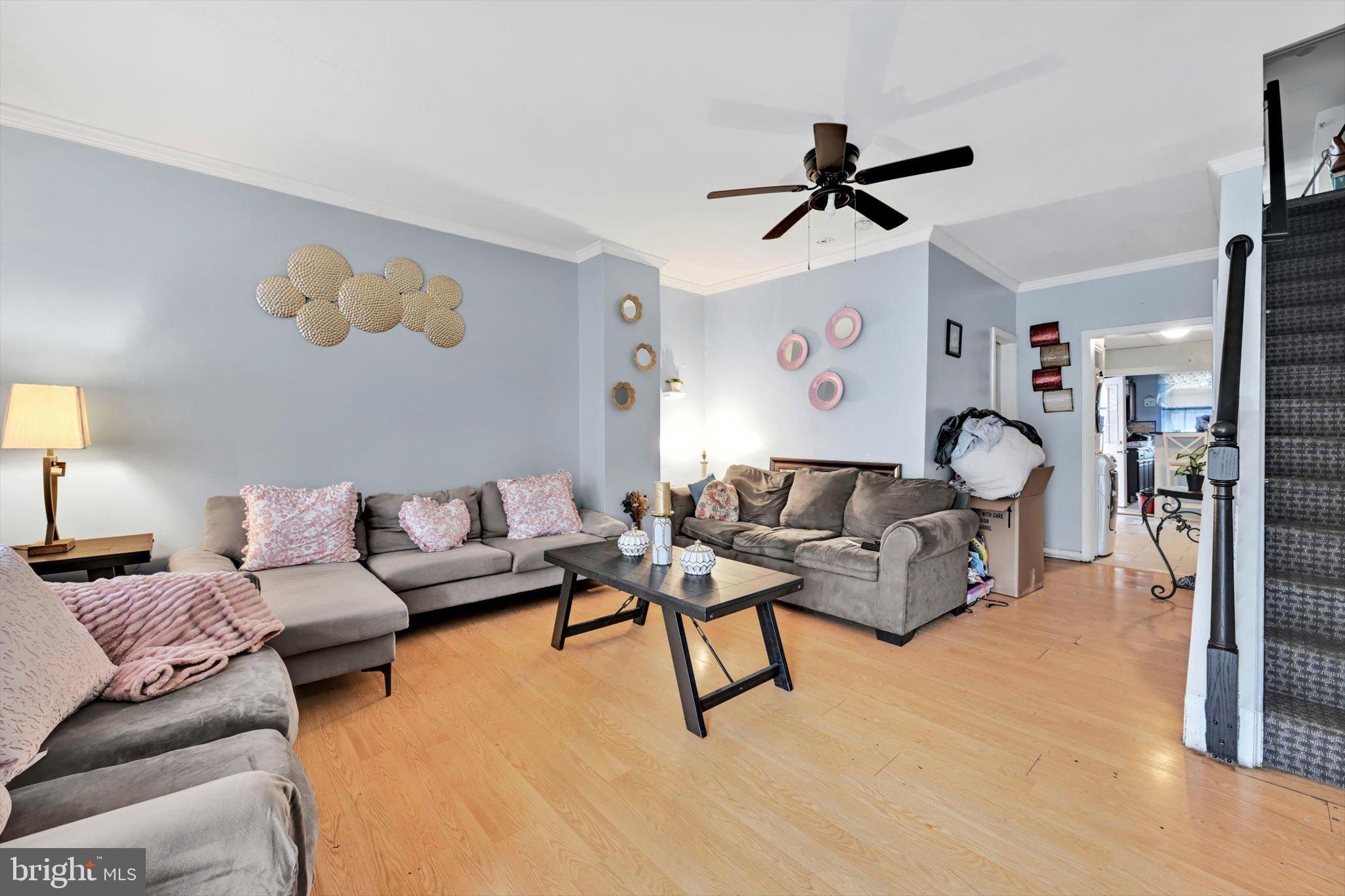 352 South Ann Street Lancaster, PA 17602 - Photo 6 of 23 a living room with furniture and a clock