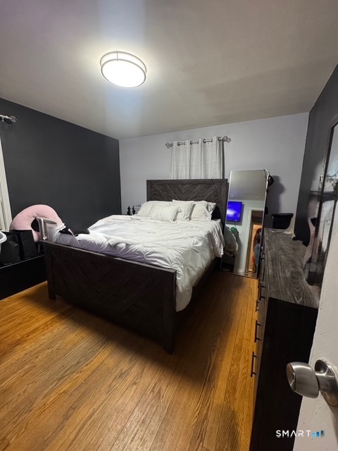 33 Westview Street Hamden, CT 06514 - Photo 6 of 11 a bedroom with bed and window