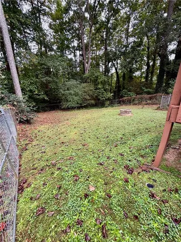 a view of balcony with wooden floor