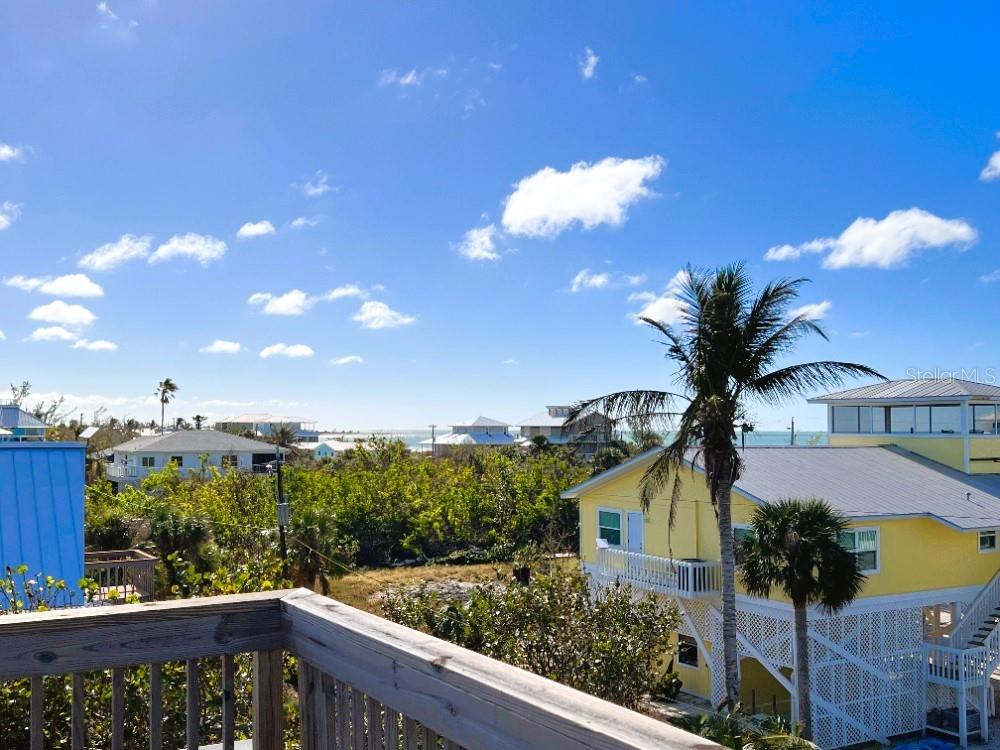 9526 Jolly Roger Trail Placida, FL 33946 - Photo 24 of 54 a view of a balcony with an outdoor space