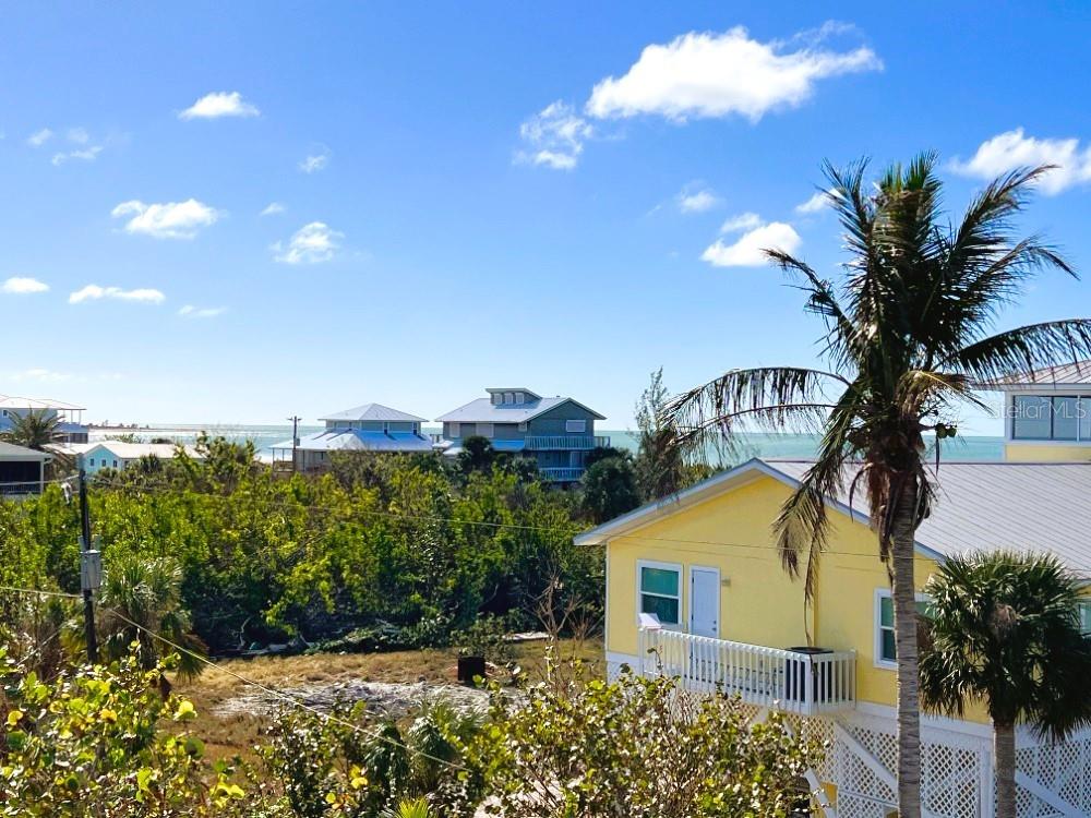 9526 Jolly Roger Trail Placida, FL 33946 - Photo 26 of 54 a view of a yard in front of house