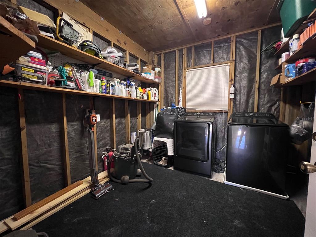 9526 Jolly Roger Trail Placida, FL 33946 - Photo 33 of 54 a view of a room with gym equipment