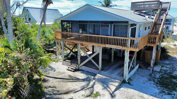 an aerial view of a house roof deck