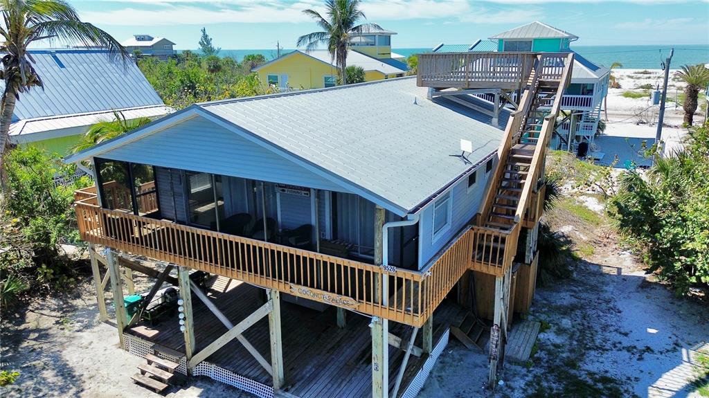 9526 Jolly Roger Trail Placida, FL 33946 - Photo 54 of 54 an aerial view of a house roof deck
