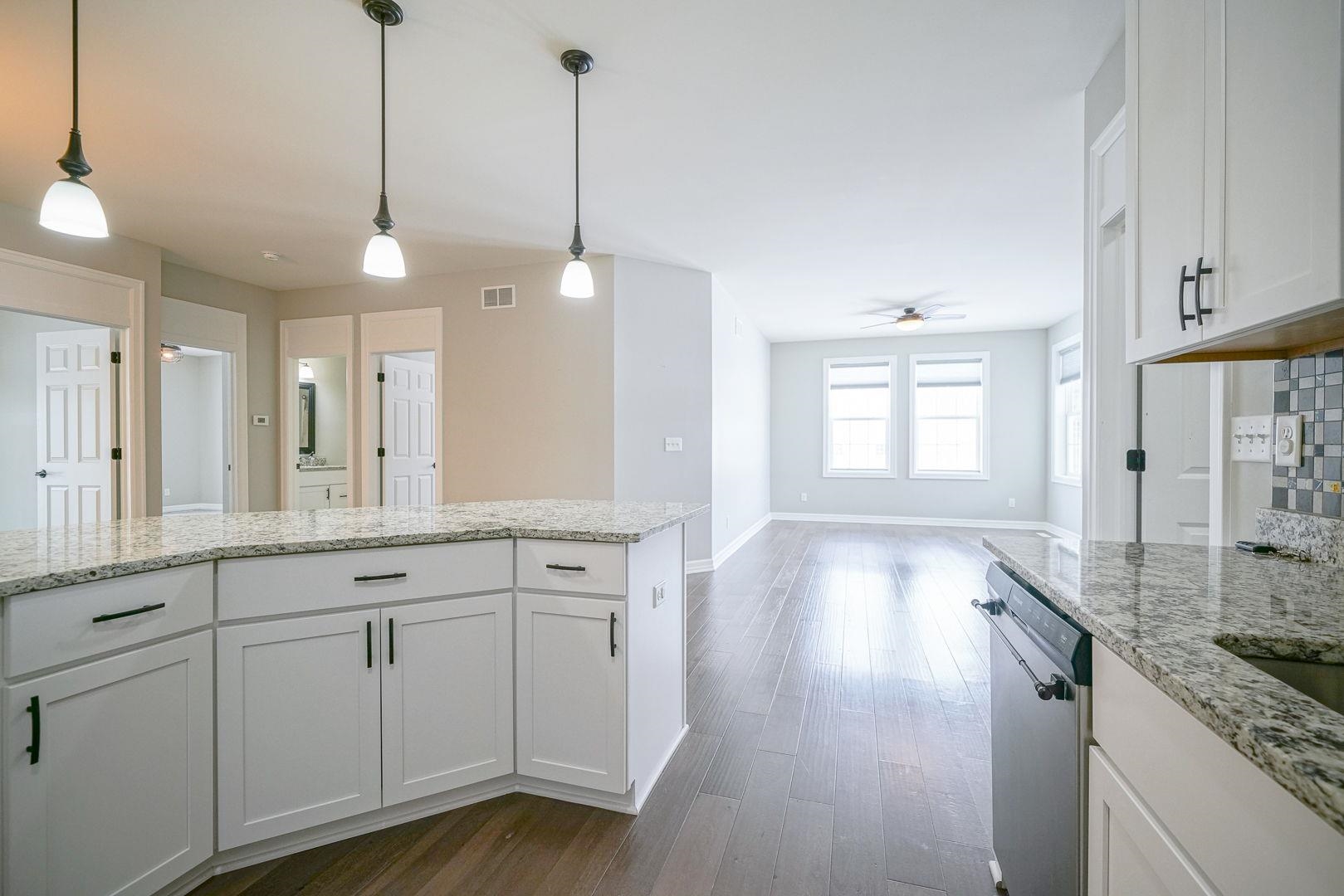 212 Martin Avenue Oregon, IL 61061 - Photo 11 of 29 a view of a kitchen counter space and wooden floor