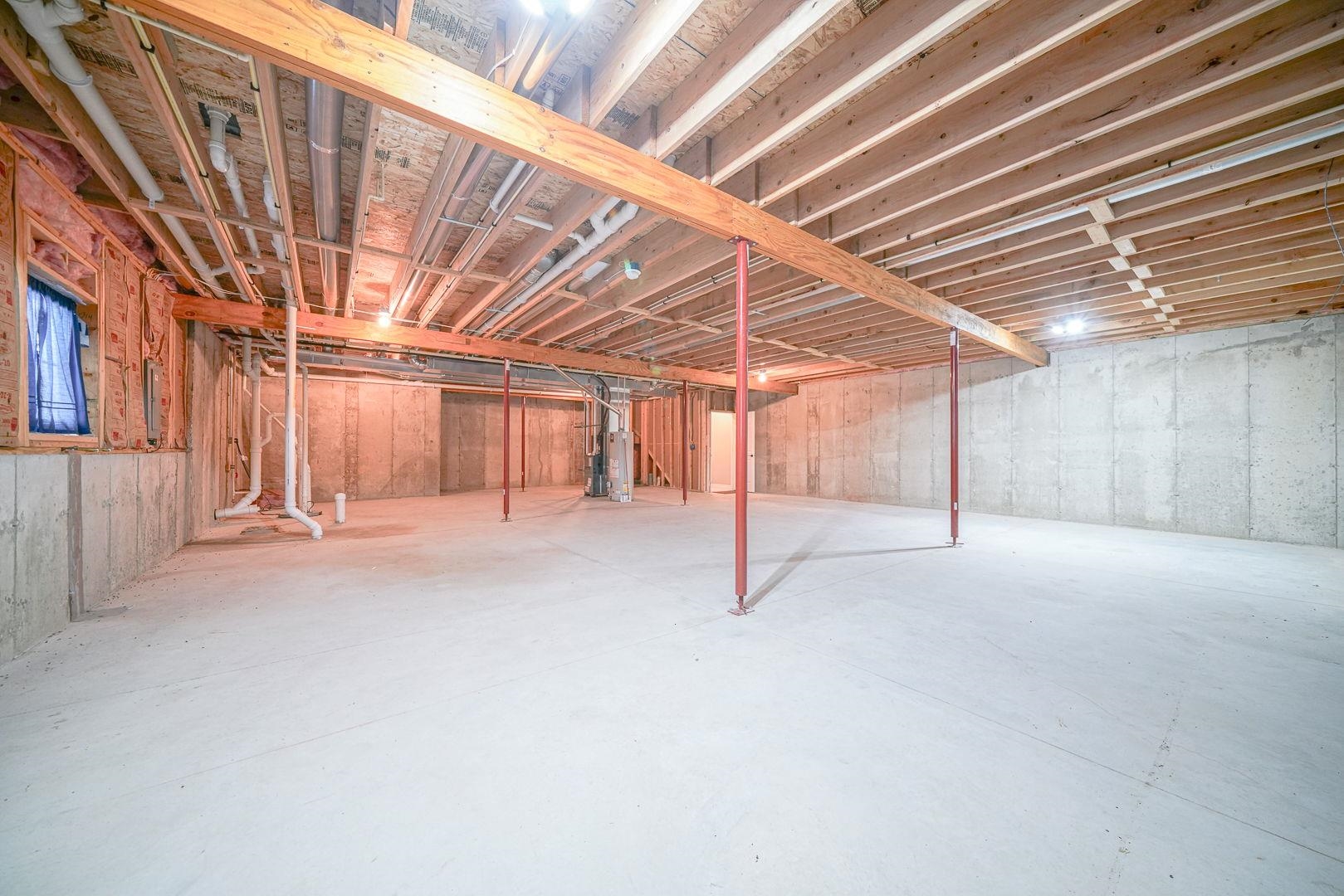 212 Martin Avenue Oregon, IL 61061 - Photo 23 of 29 a view of empty room with wooden walls