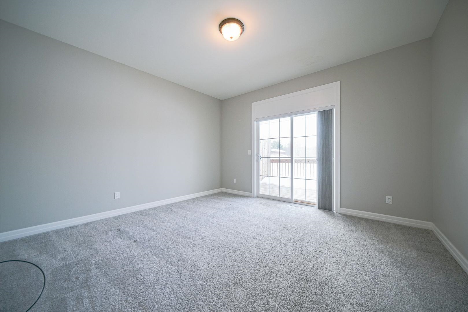 212 Martin Avenue Oregon, IL 61061 - Photo 26 of 29 an empty room with windows