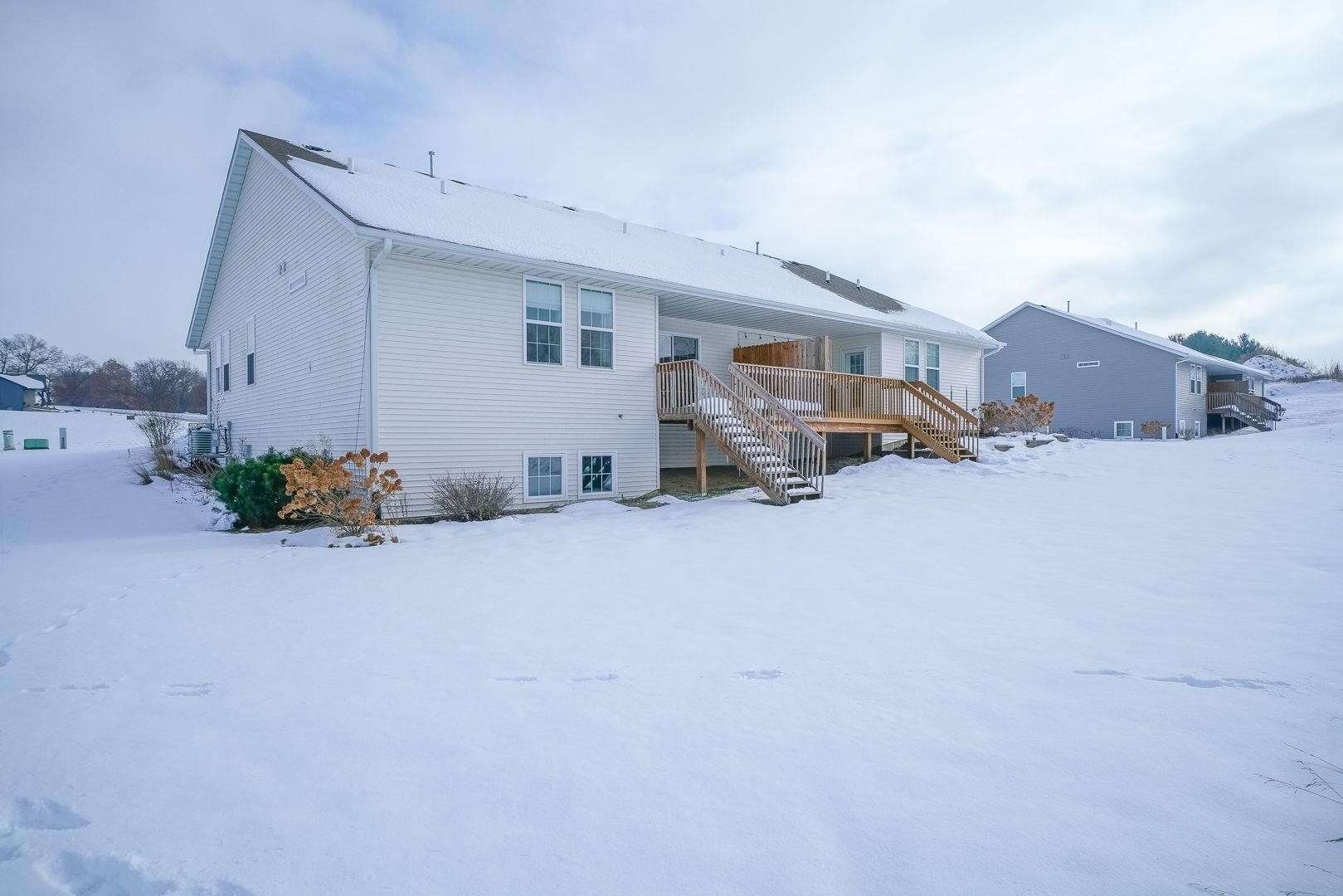 212 Martin Avenue Oregon, IL 61061 - Photo 27 of 29 a view of a house with a snow in front of it