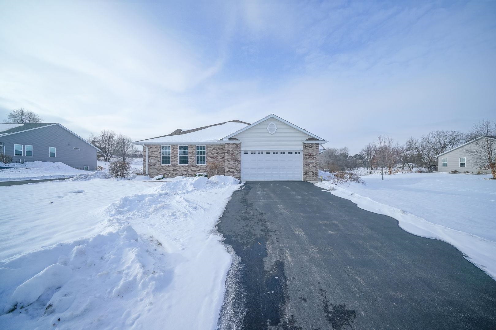 212 Martin Avenue Oregon, IL 61061 - Photo 29 of 29 a front view of a house with a yard