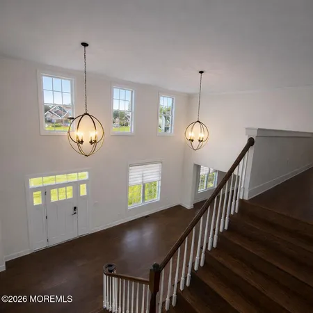 a view of a hallway with windows