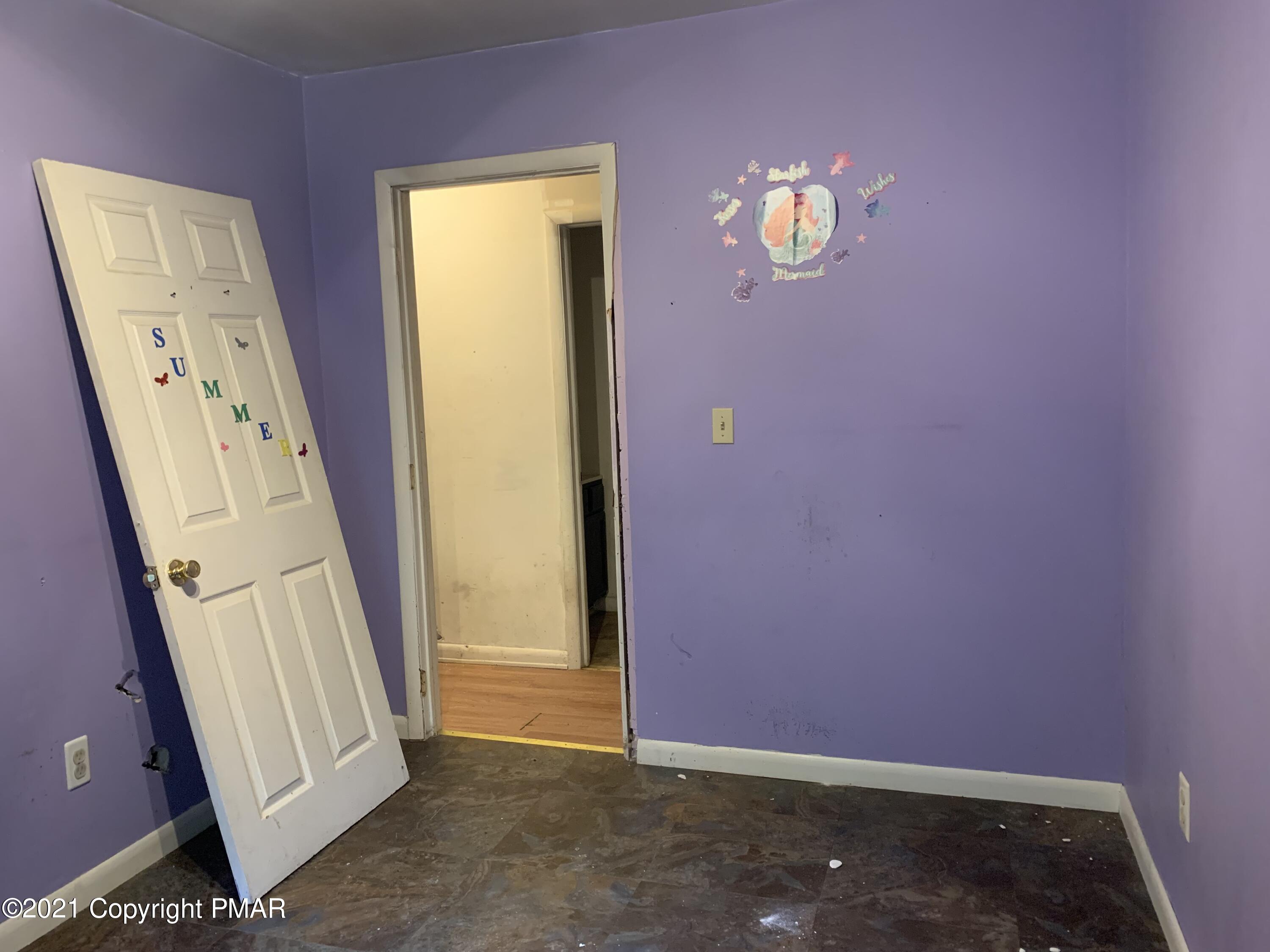 203 Semmel Road Effort, PA 18330 - Photo 12 of 18 a view of an entryway with wooden floor