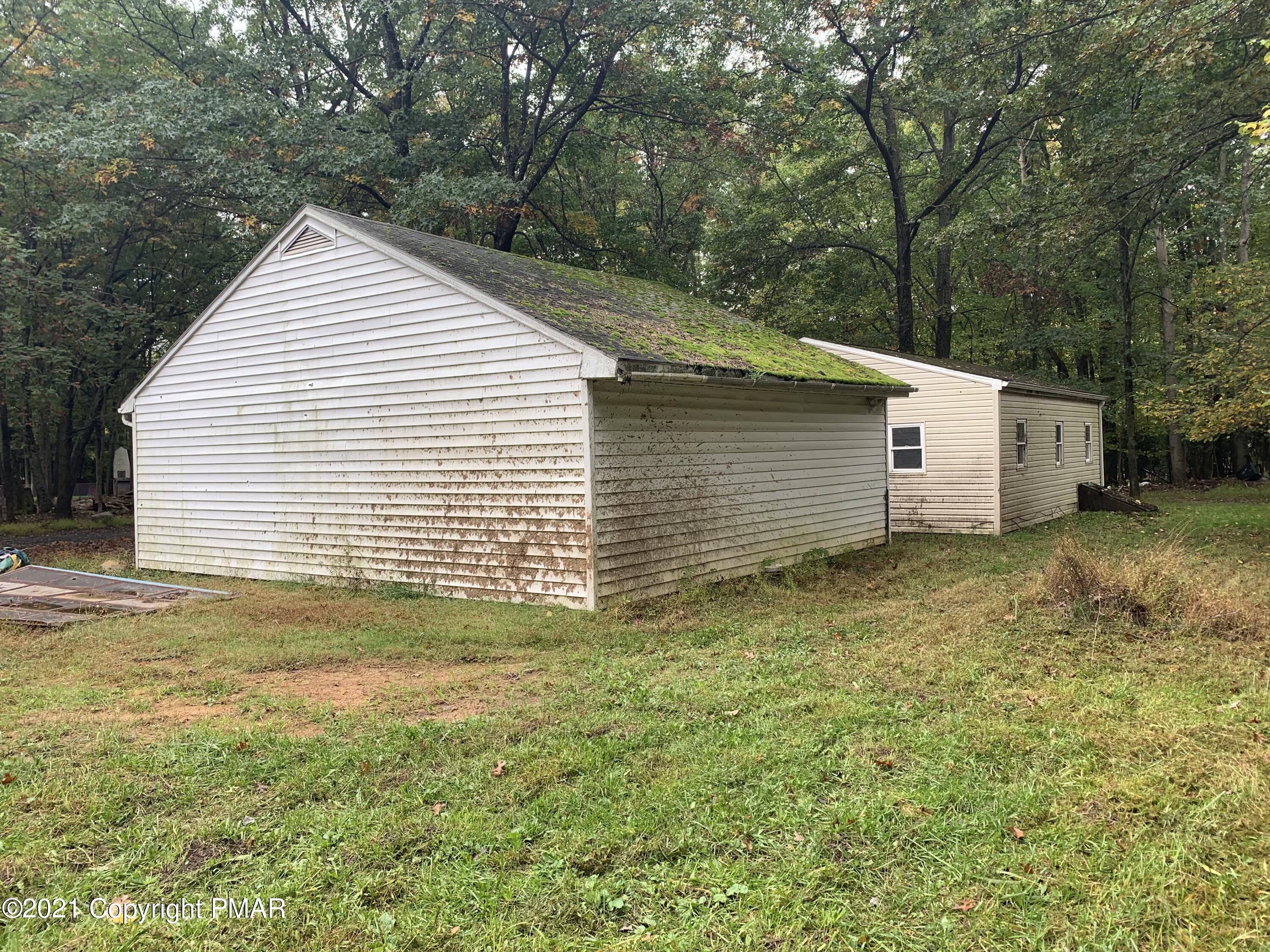 203 Semmel Road Effort, PA 18330 - Photo 5 of 18 a view of a backyard with a garden