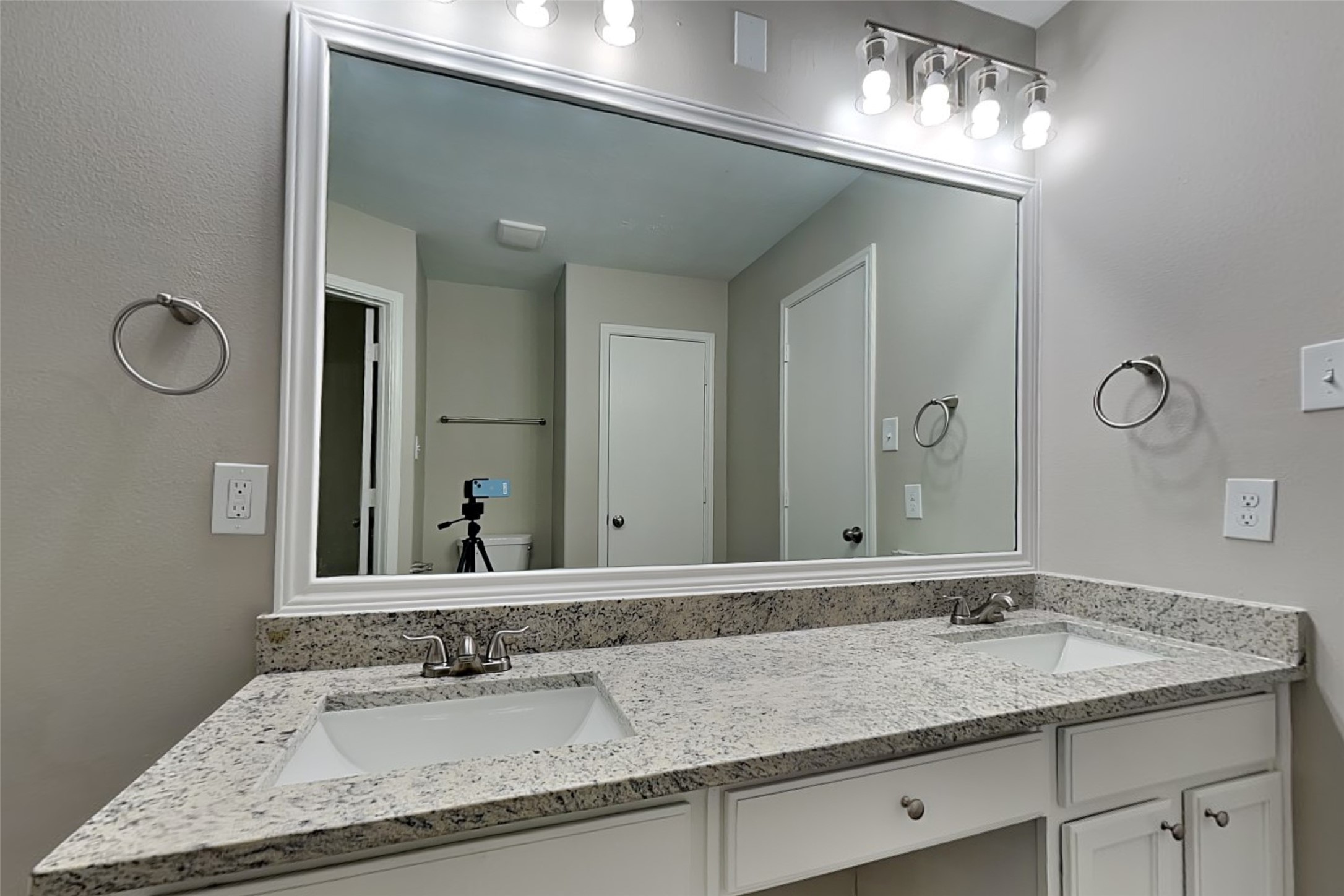 29207 Fox Fountain Lane Spring, TX 77386 - Photo 14 of 24 a bathroom with a granite countertop sink and a mirror
