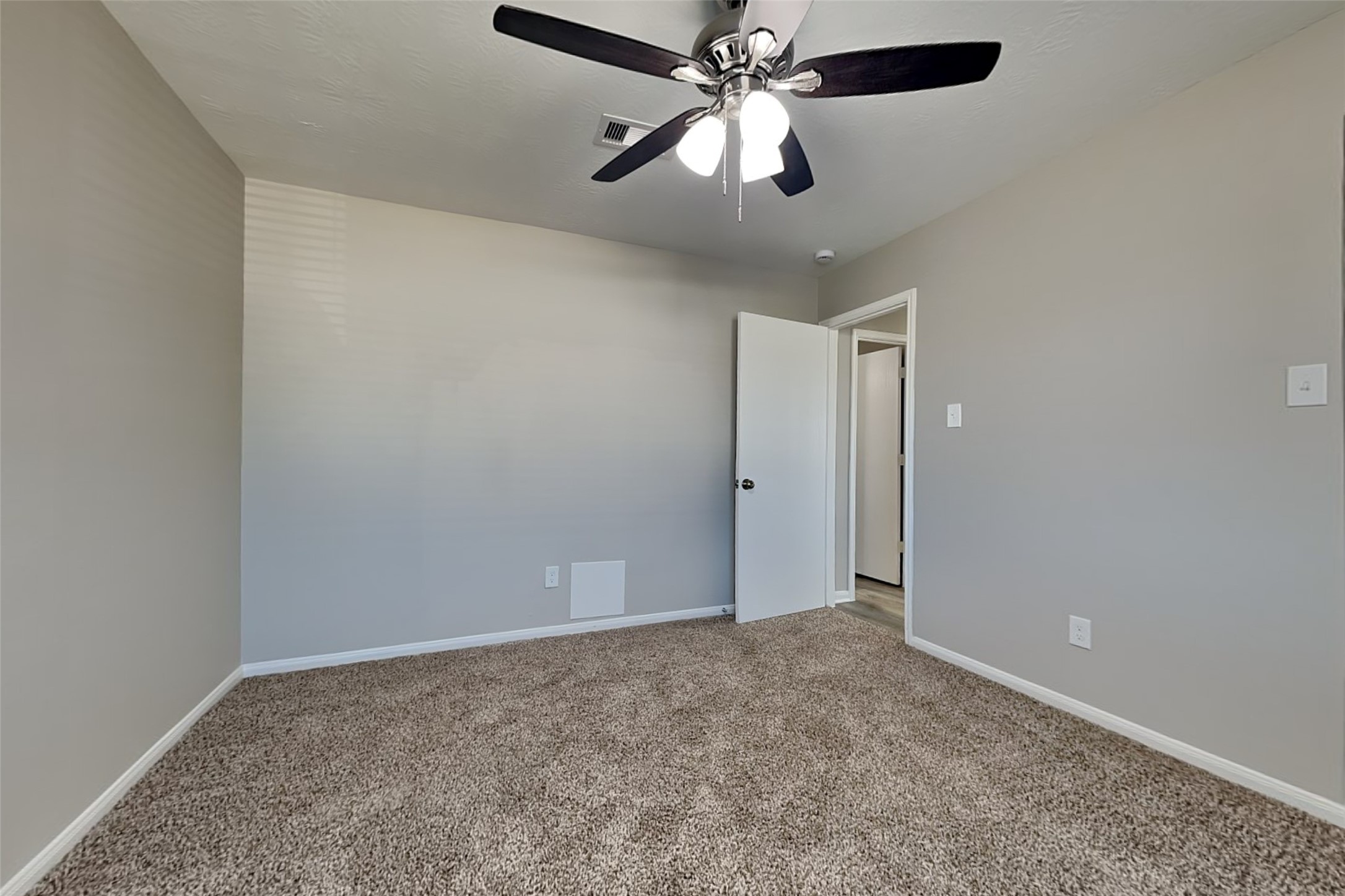 29207 Fox Fountain Lane Spring, TX 77386 - Photo 17 of 24 an empty room with a fan and a fan