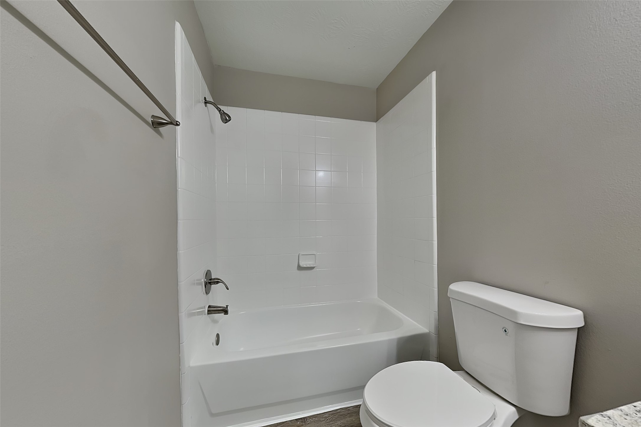 29207 Fox Fountain Lane Spring, TX 77386 - Photo 20 of 24 a bathroom with a toilet and a bathtub