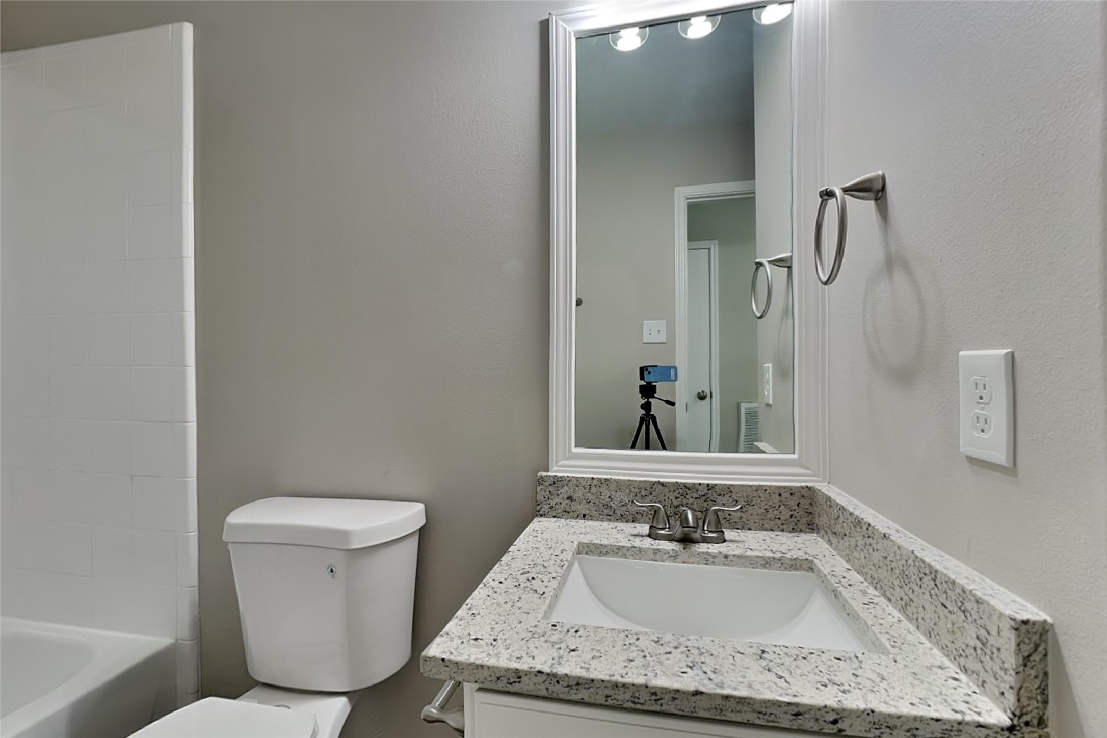 29207 Fox Fountain Lane Spring, TX 77386 - Photo 21 of 24 a bathroom with a granite countertop sink and a mirror
