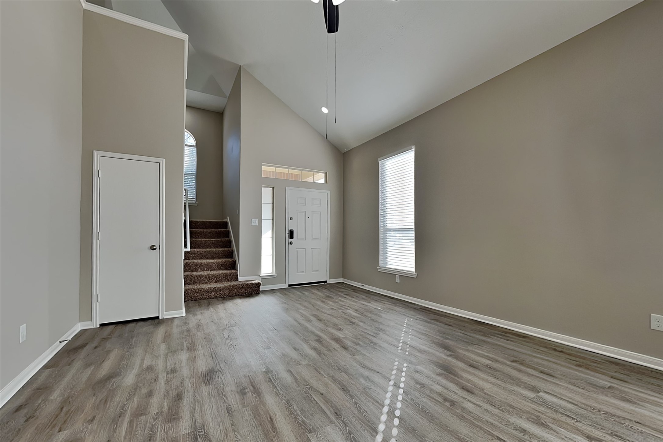 29207 Fox Fountain Lane Spring, TX 77386 - Photo 3 of 24 wooden floor in an empty room with a window