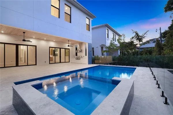 a view of a balcony with seating space