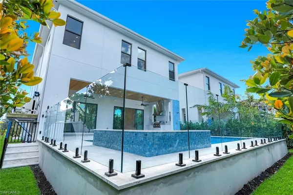a aerial view of a house with a yard