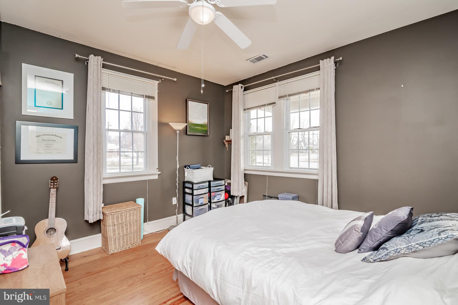 71 Chatham Heights Road Fredericksburg, VA 22405 - Photo 11 of 25 a bedroom with a bed and a large window