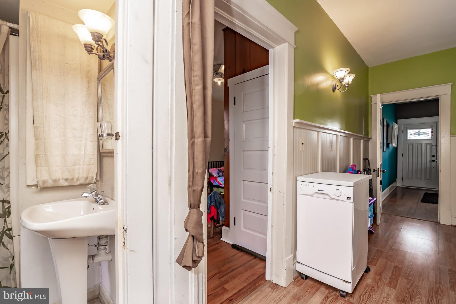 71 Chatham Heights Road Fredericksburg, VA 22405 - Photo 20 of 25 a bathroom with a sink a mirror and a shower