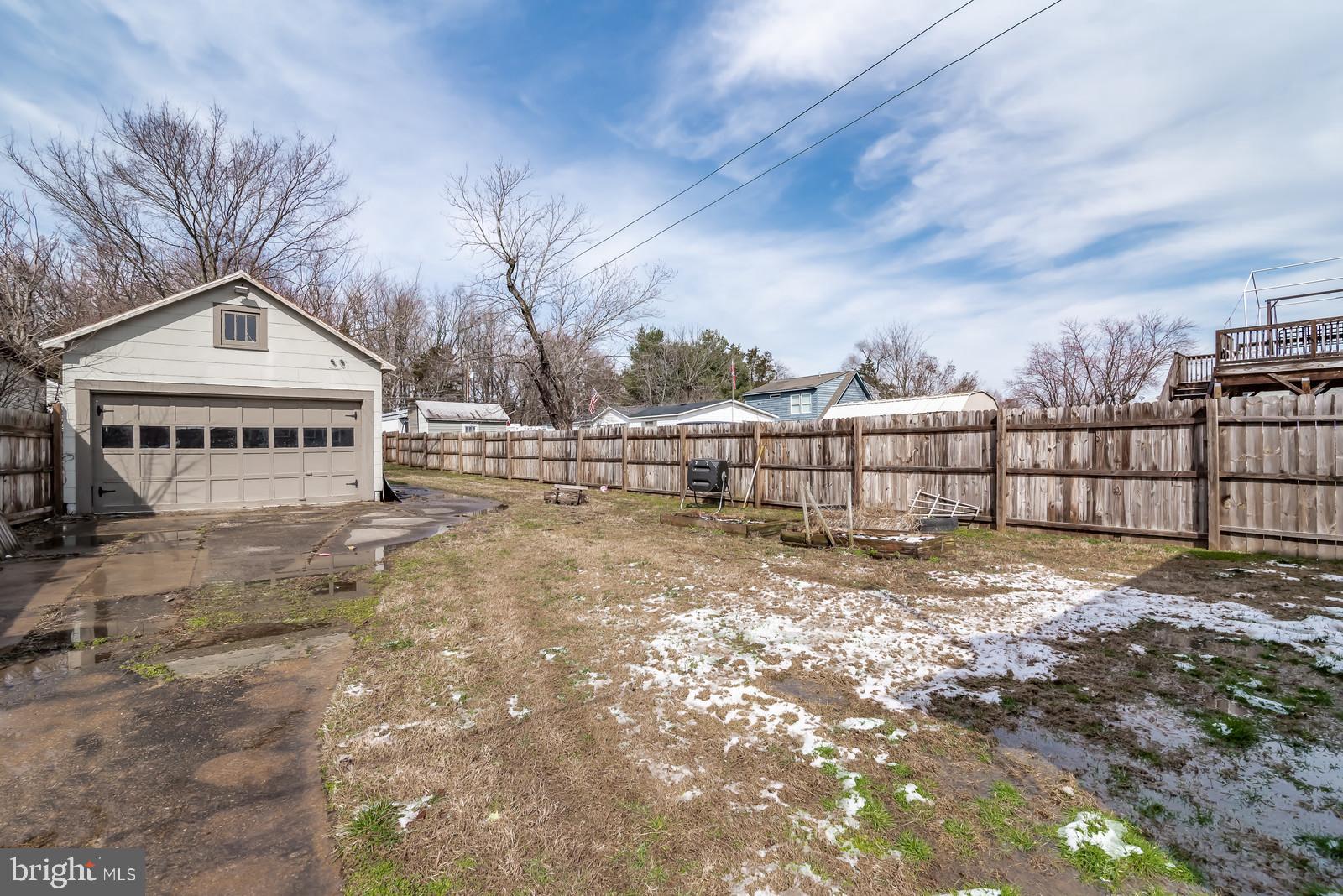 71 Chatham Heights Road Fredericksburg, VA 22405 - Photo 22 of 25 a view of a backyard with a large tree