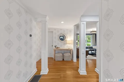 a spacious bathroom with a double vanity sink mirror and bathtub