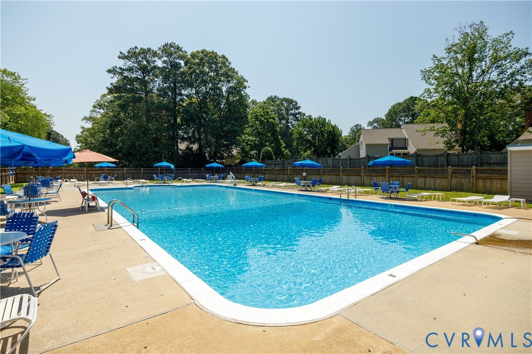 9129 Derbyshire Road, Unit E Henrico, VA 23229 - Photo 34 of 36 Large outdoor swimming pool with concrete decking
