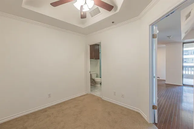 a bathroom with a sink double vanity granite tub shower and a mirror
