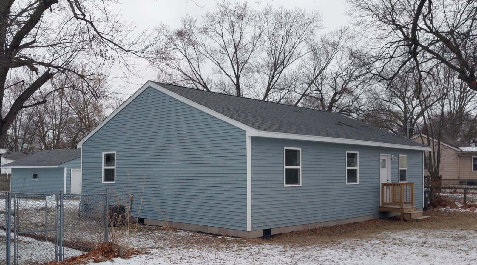 4124 Liverpool Road Lake Station, IN 46405 - Photo 1 of 18 a view of a house with a yard