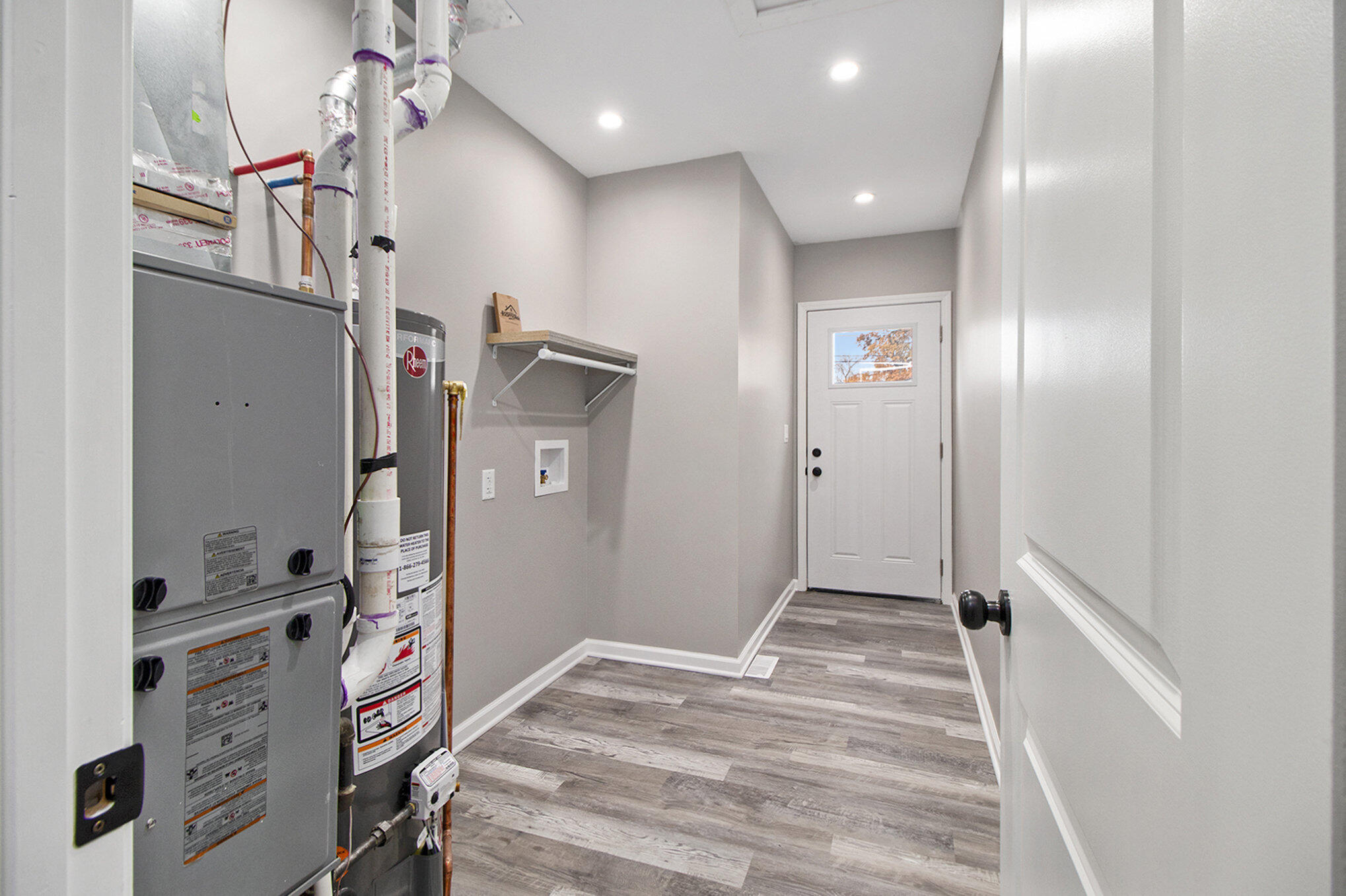 4124 Liverpool Road Lake Station, IN 46405 - Photo 15 of 18 a view of a hallway with closet and a window
